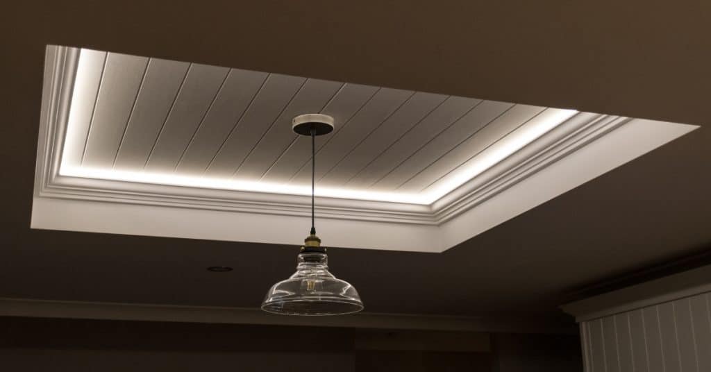 Recessed LED lighting with hanging lighting fixture installed