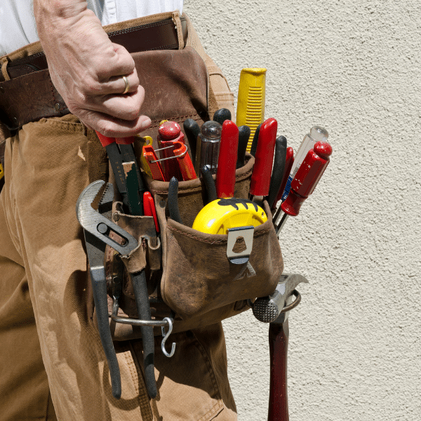 Certified Electrician With Tools and Safety Gear