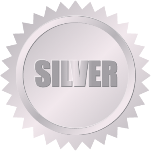A silver badge worn by a master electrician.